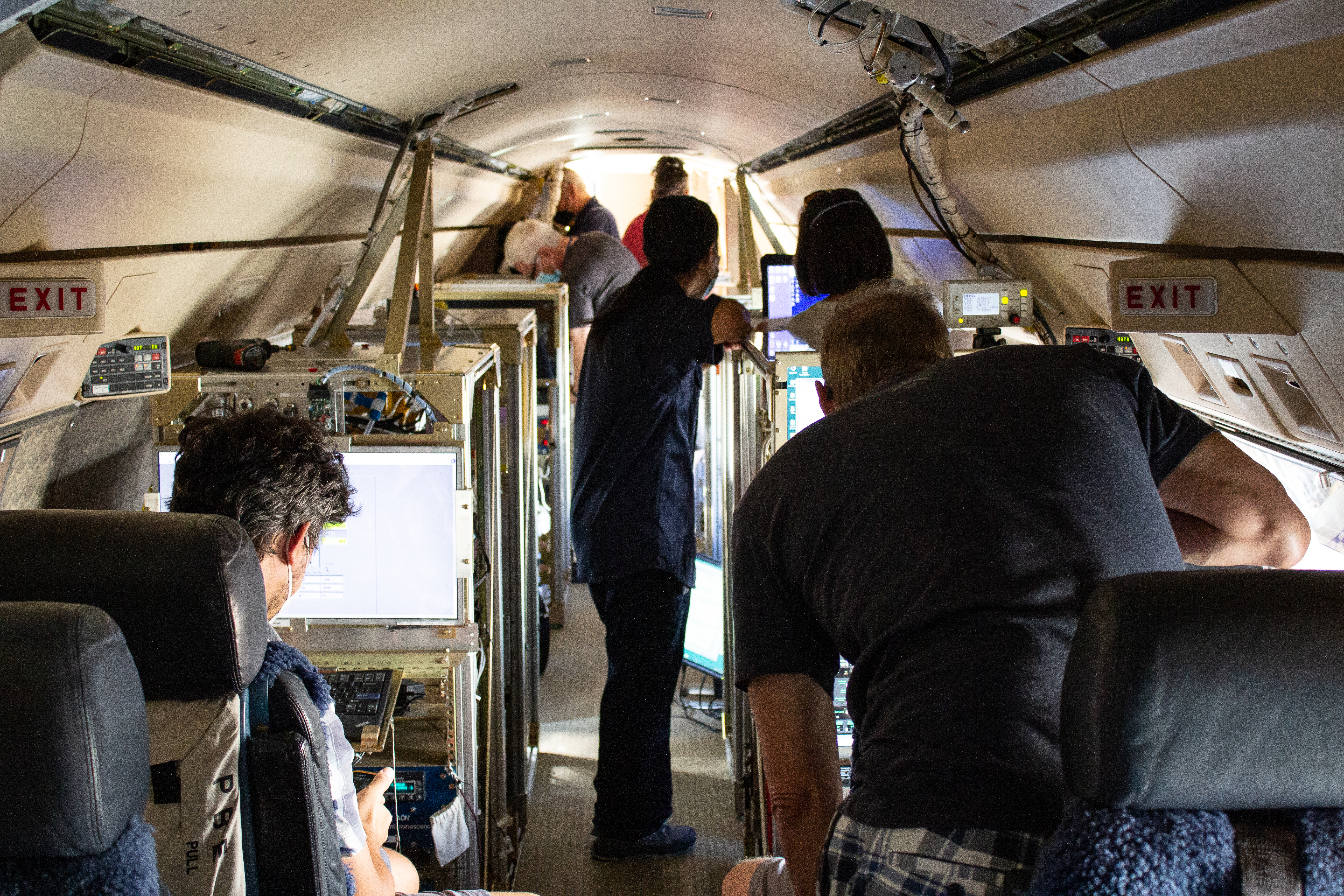ACCLIP scientists preparing their instruments for a test flight. (Rebecca Hornbrook)