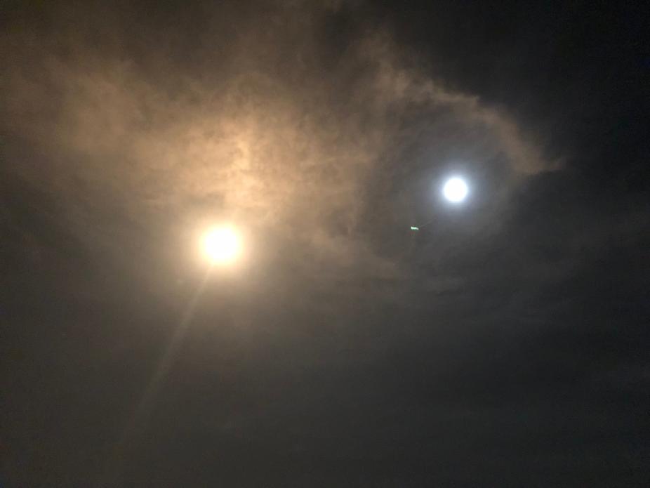 TEMPO Satellite Rocket Passing Full Moon