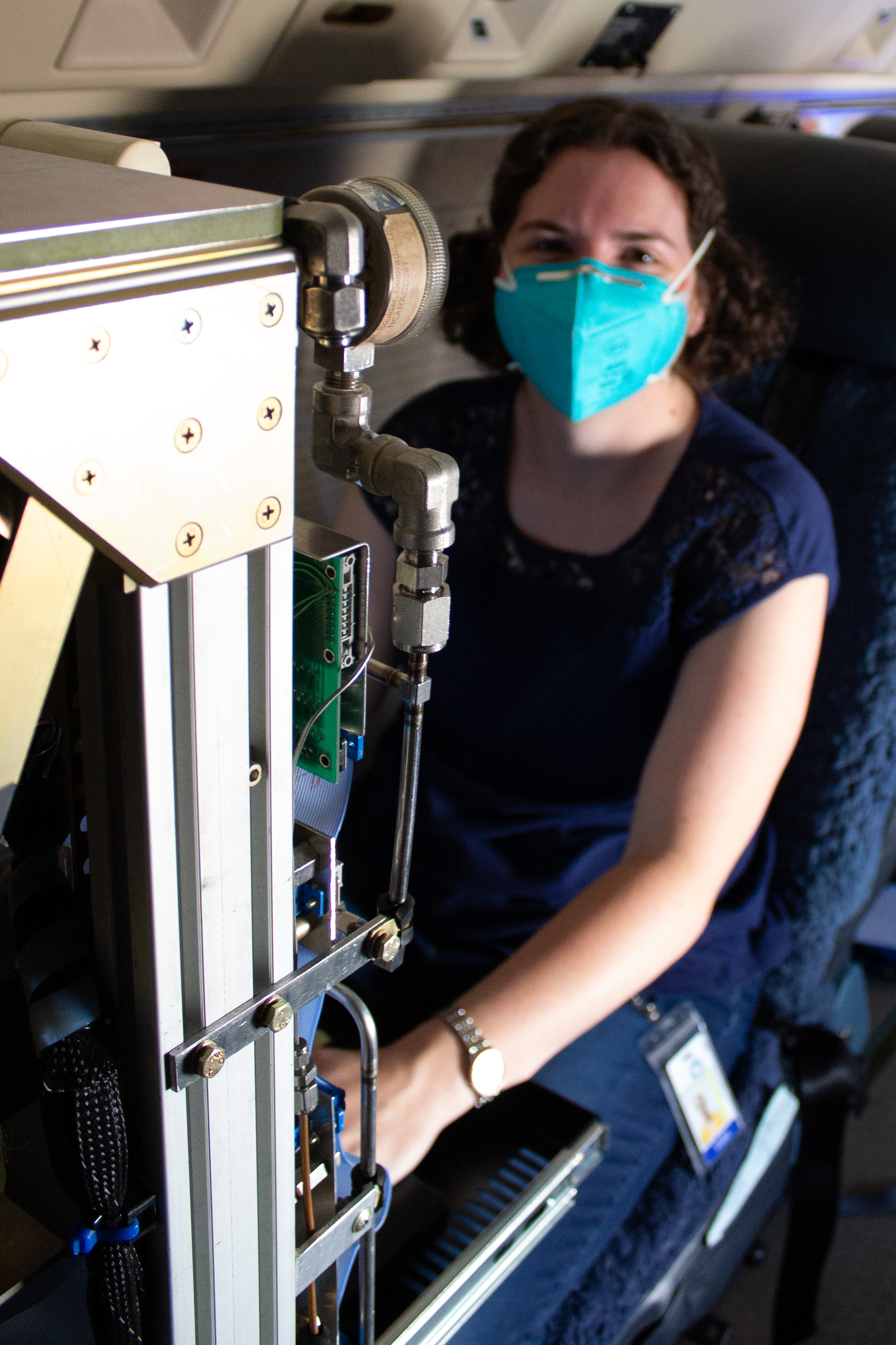 University of Miami scientist Victoria Treadaway prepares the AWAS instrument for an ACCLIP test flight. (Rebecca Hornbrook)