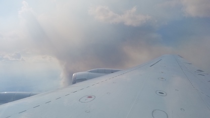 Looking out the TOGA-TOF window of NASA DC8 at smoke plume during FIREX-AQ 2019.