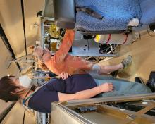 Laura Pan and Teresa Campos prepare instrumentation. (Ren Smith)