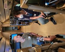 Alan Hills and Laura Pan discuss in-cabin preparations. (Ren Smith)