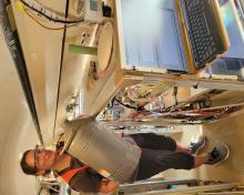 NCAR/ACOM's Becky Hornbrook preparing the TOGA instrument with liquid nitrogen before takeoff, August 15 (Ren Smith)
