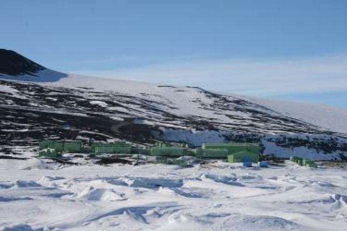 New Zealand's Scott Base as photographed from the sea ice off the shore of Ross Island in Antarctica. Image by Tas50 at Wikimedia Commons.