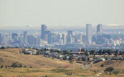 Denver Downtown view from Red Rock Amphitheatre, by Mitul0520 at Wikimedia Commons: https://commons.wikimedia.org/wiki/File:Denver_Downtown_view_from_Red_Rock_Amphitheatre.jpg