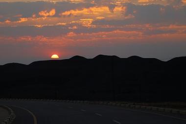  A beautiful sunset over the by-products of copper mining in Mufulira, Zambia, commonly known as The Black Mountain.